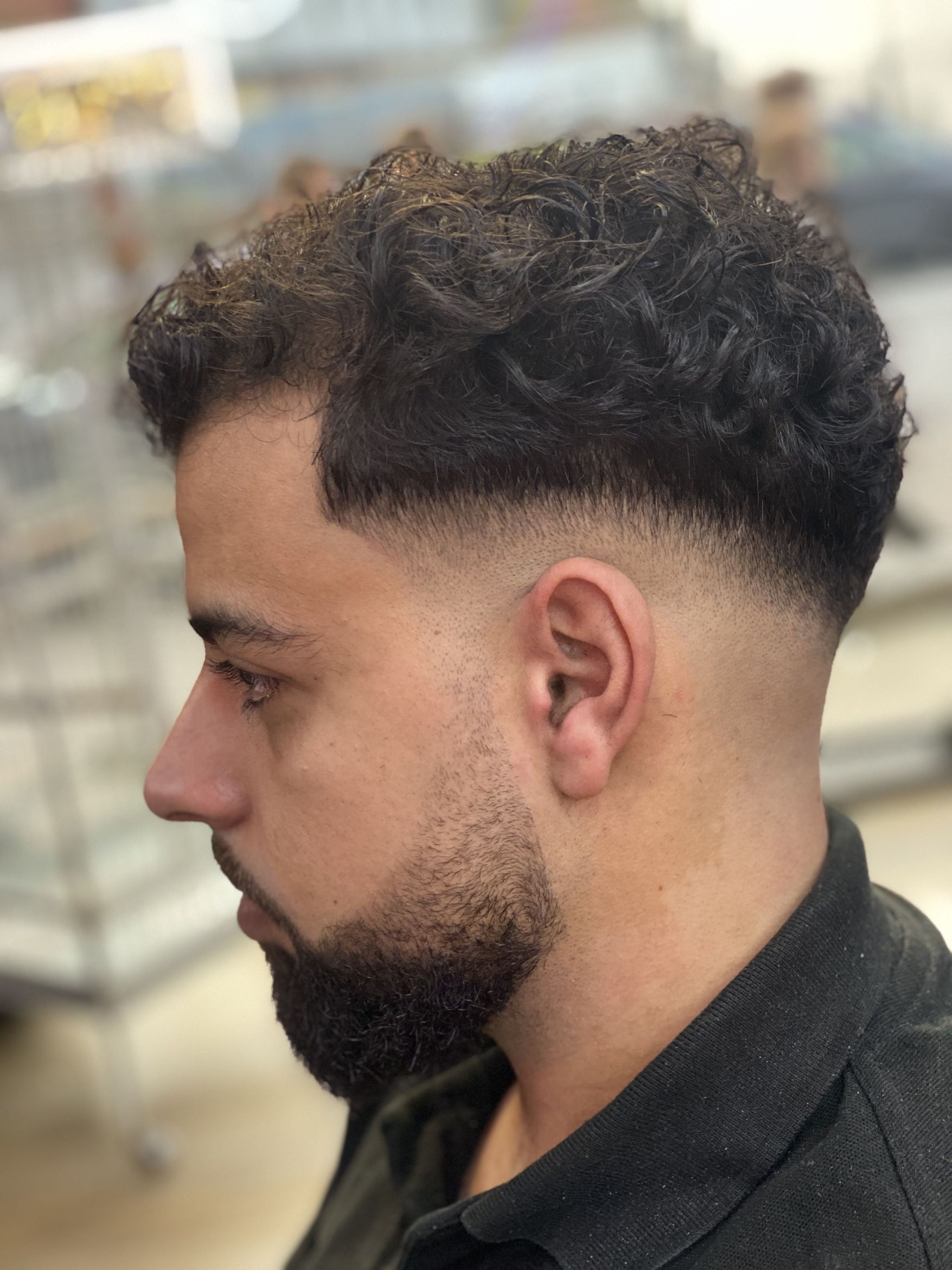 A textured skin fade and defined beard, finished at Urban Trim